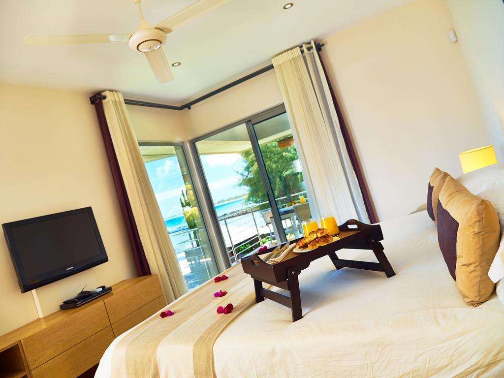Bon Azur Beachfront Suites & Penthouses With Lov Trou aux Biches Exterior photo